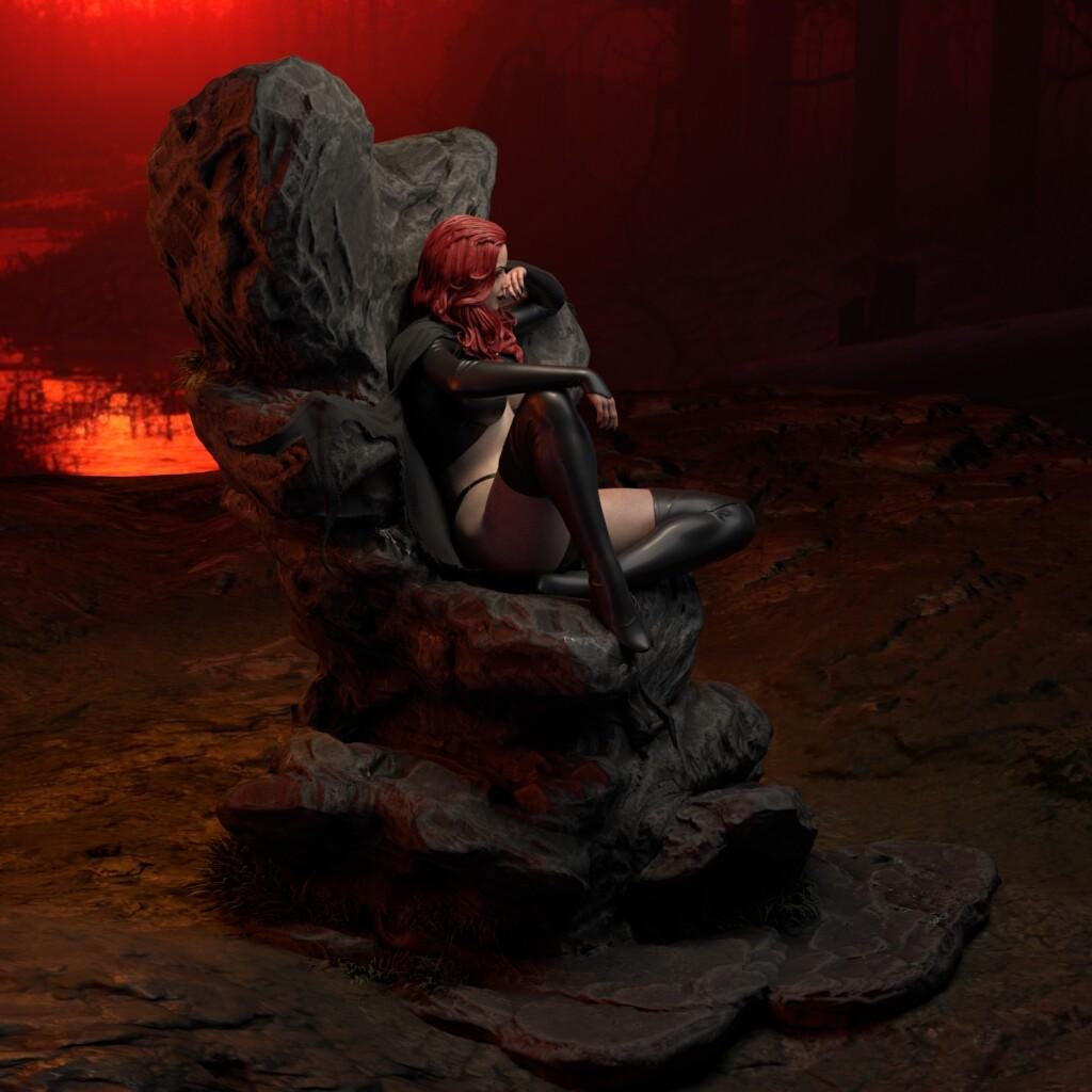 a woman sitting on top of a rock next to a red light