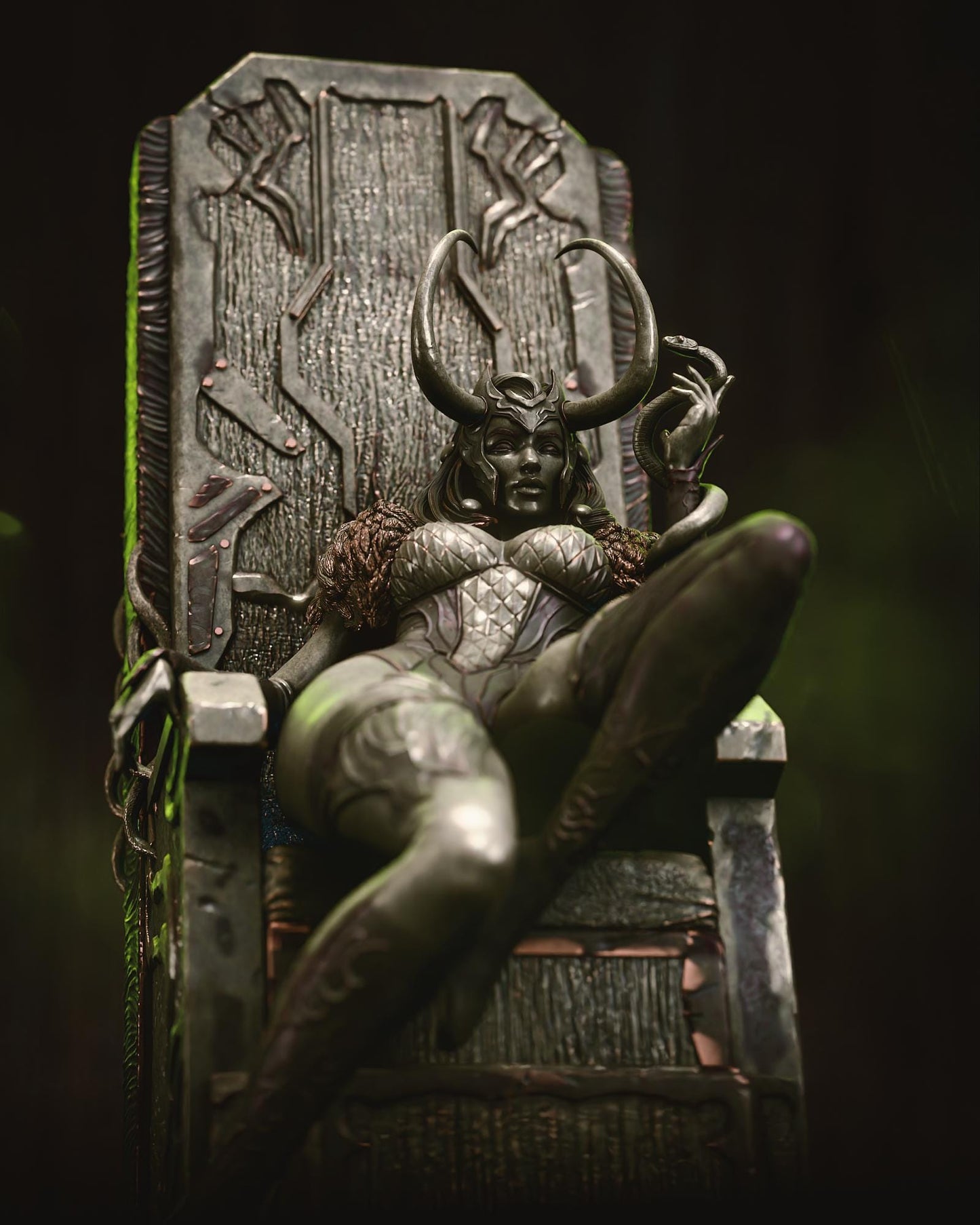 a statue of a woman sitting on top of a chair
