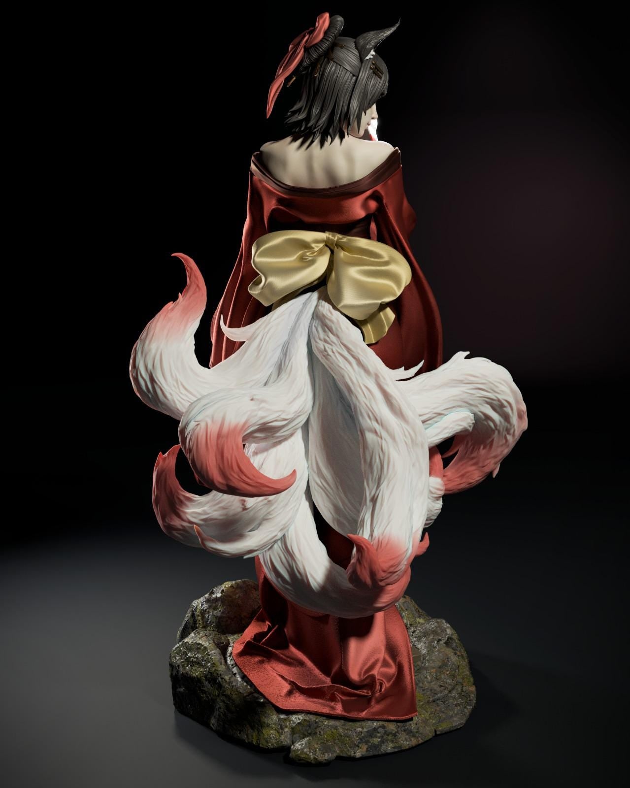 a statue of a woman in a red cape