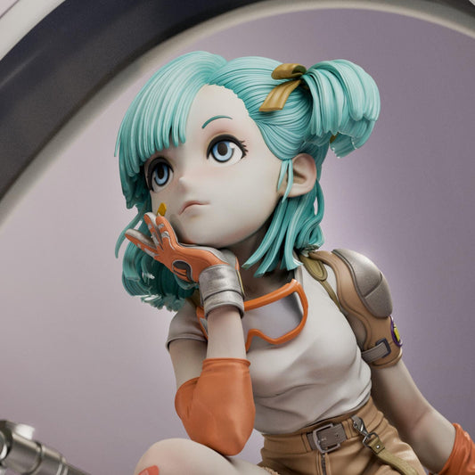 a close up of a figurine of a girl with blue hair