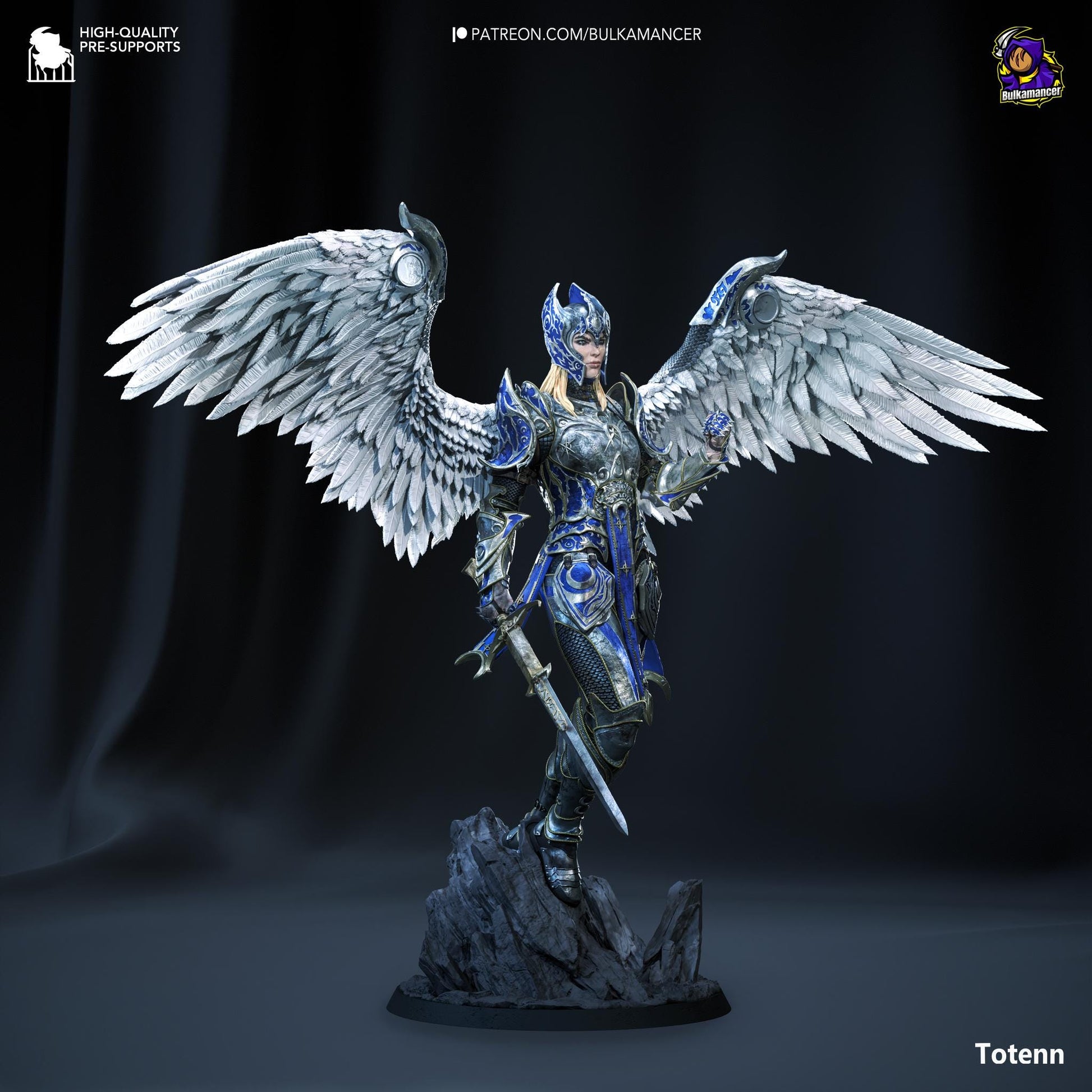 a statue of an angel holding a sword