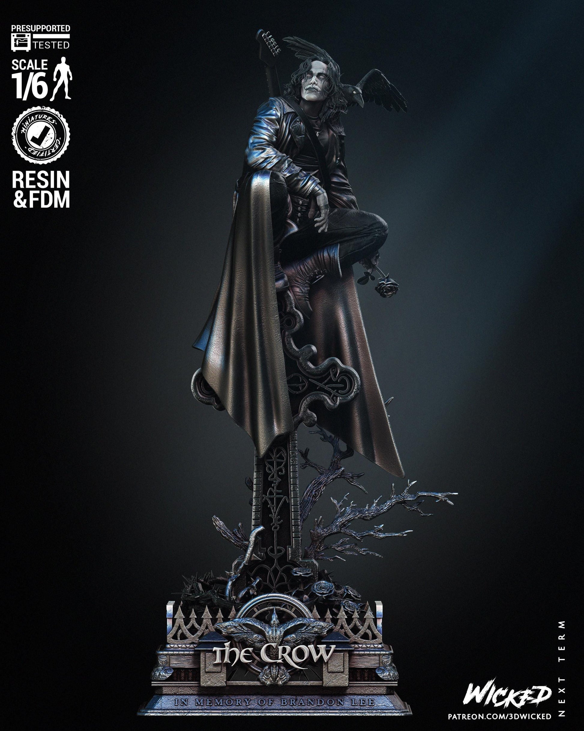 a statue of a man with a cape on top of it