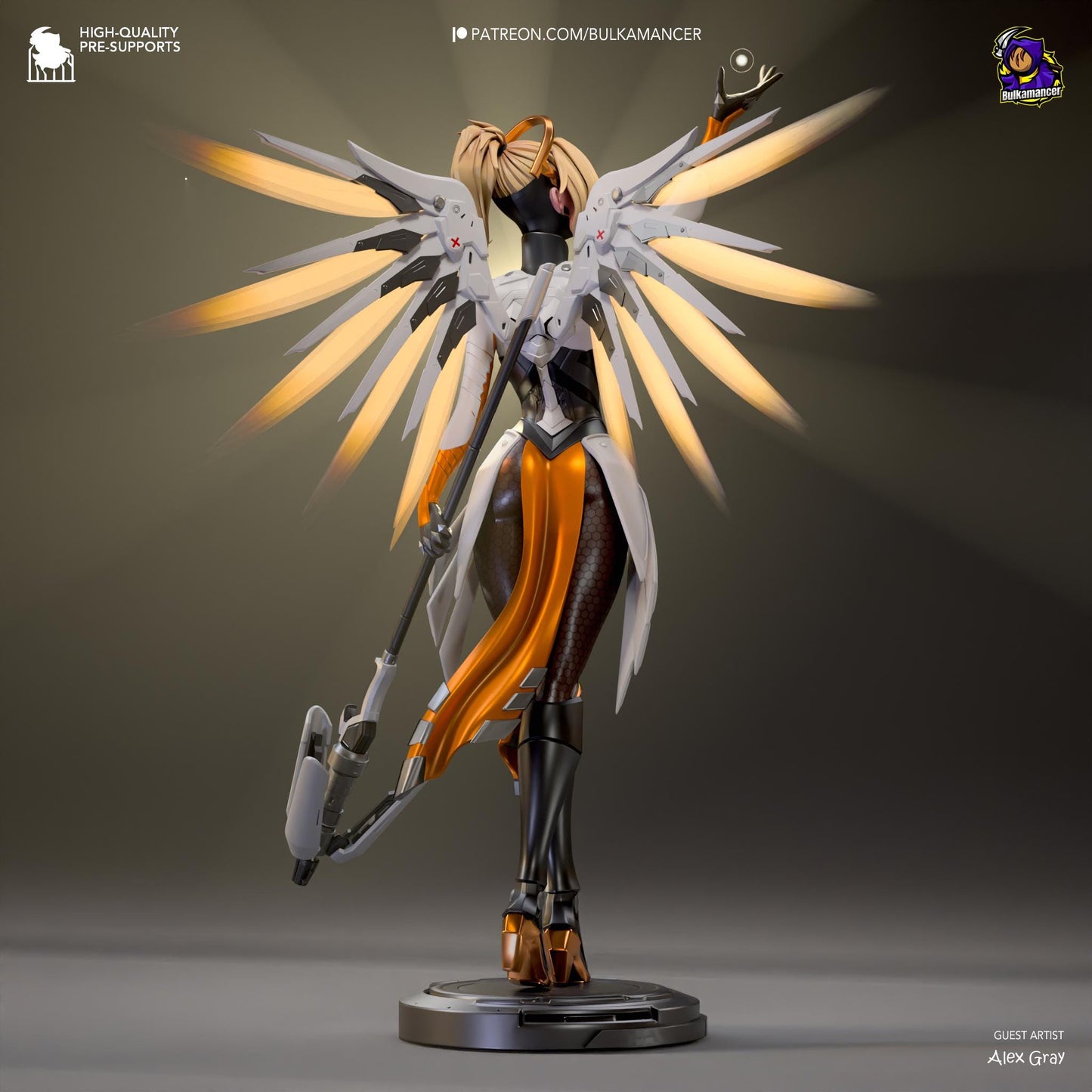 a figurine of a woman with a sword and wings