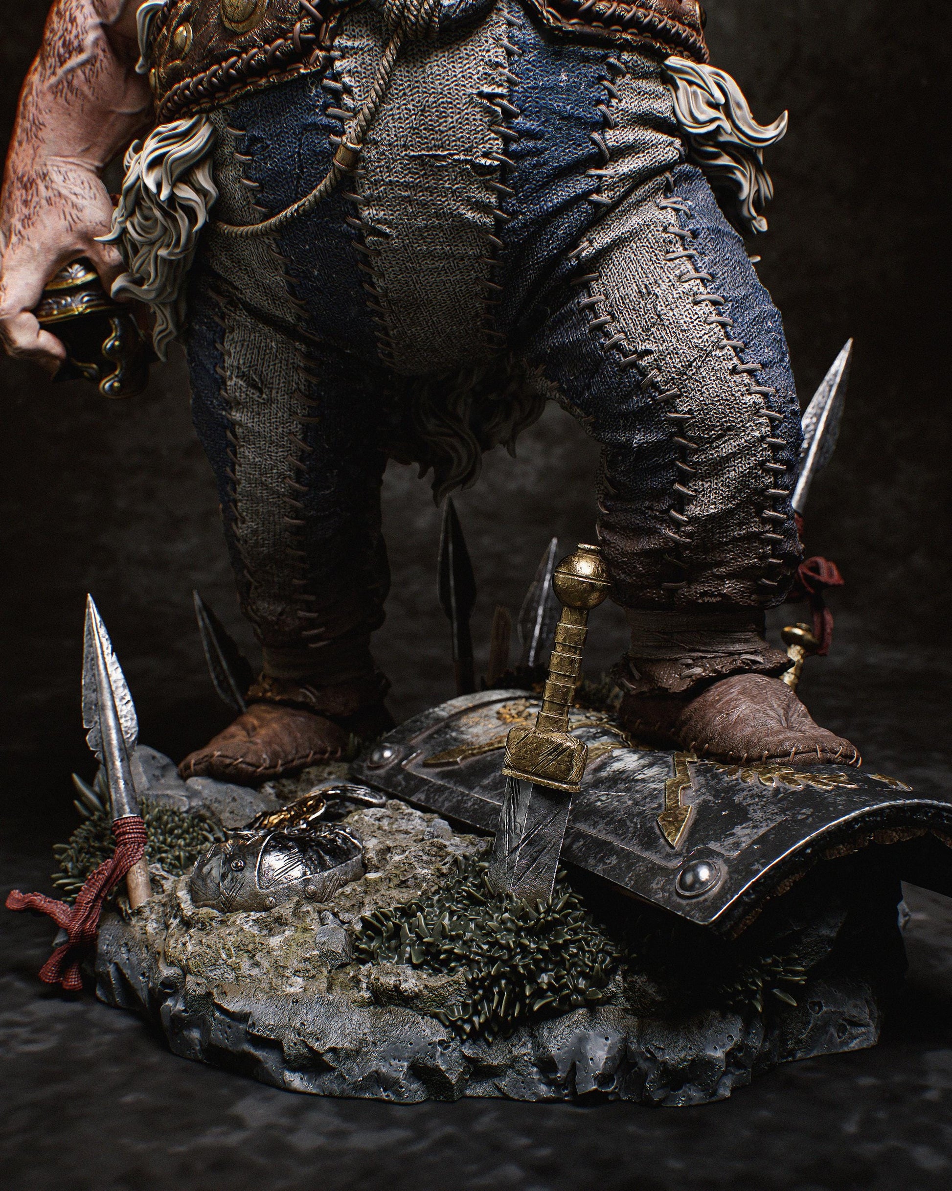 a close up of a statue of a man with a sword