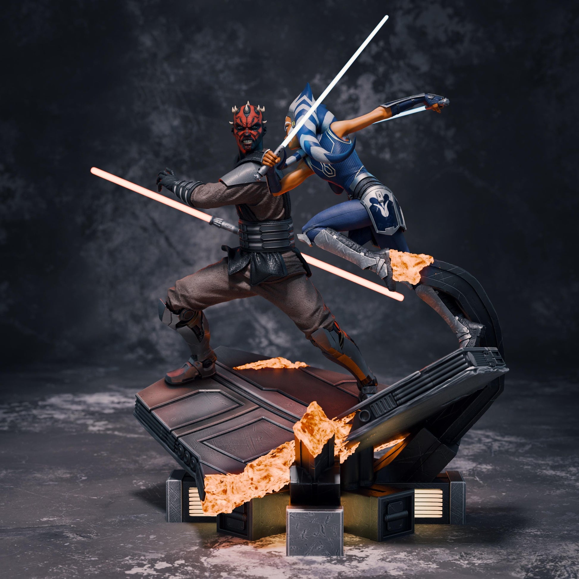 a statue of two people fighting over a fire