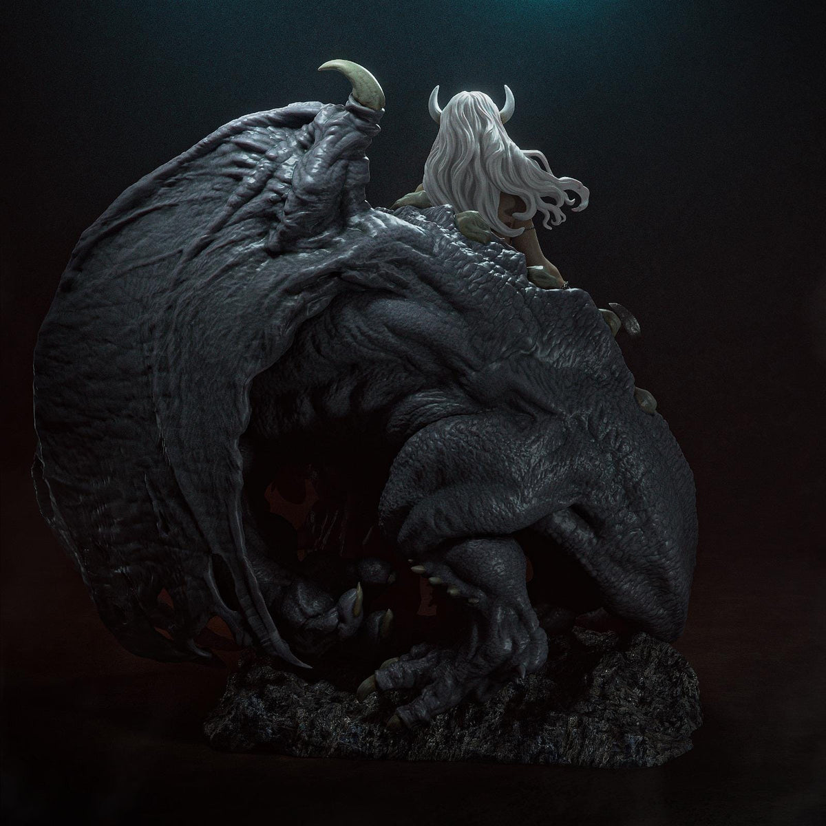 a statue of a woman riding a dragon