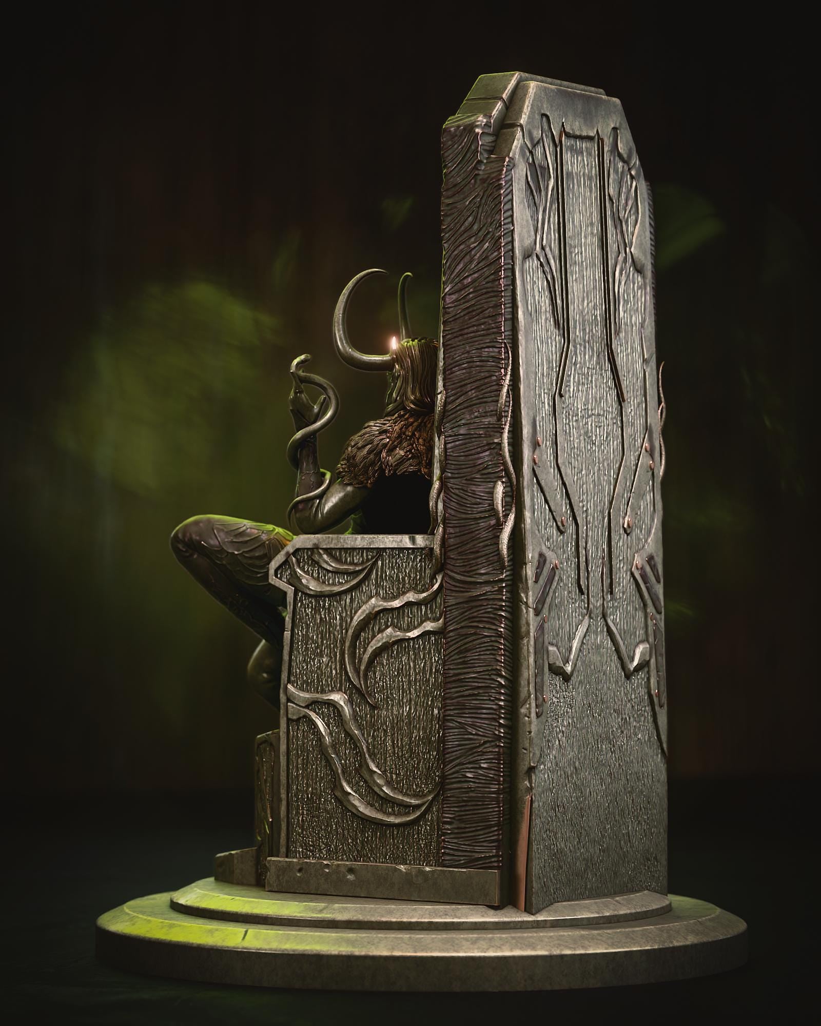 a statue of a man sitting in a chair