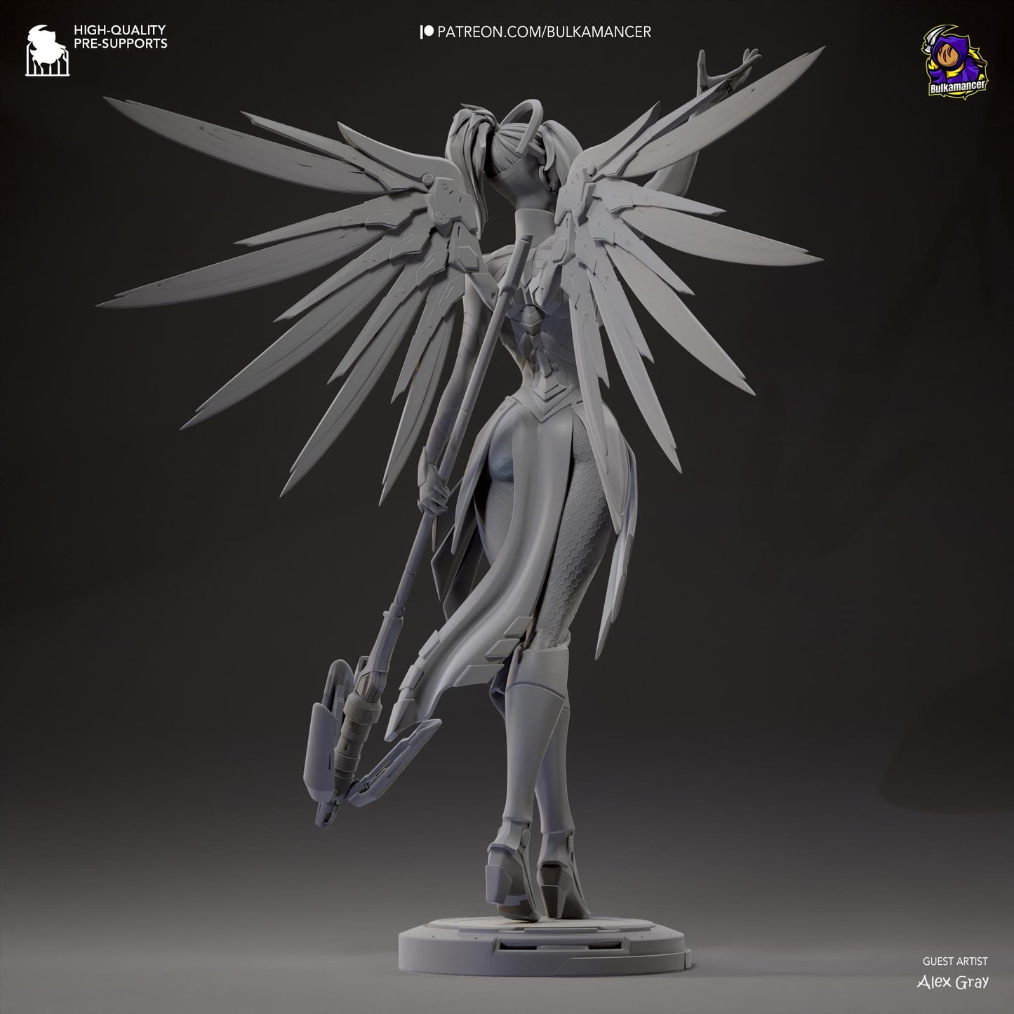 a statue of a woman with large wings