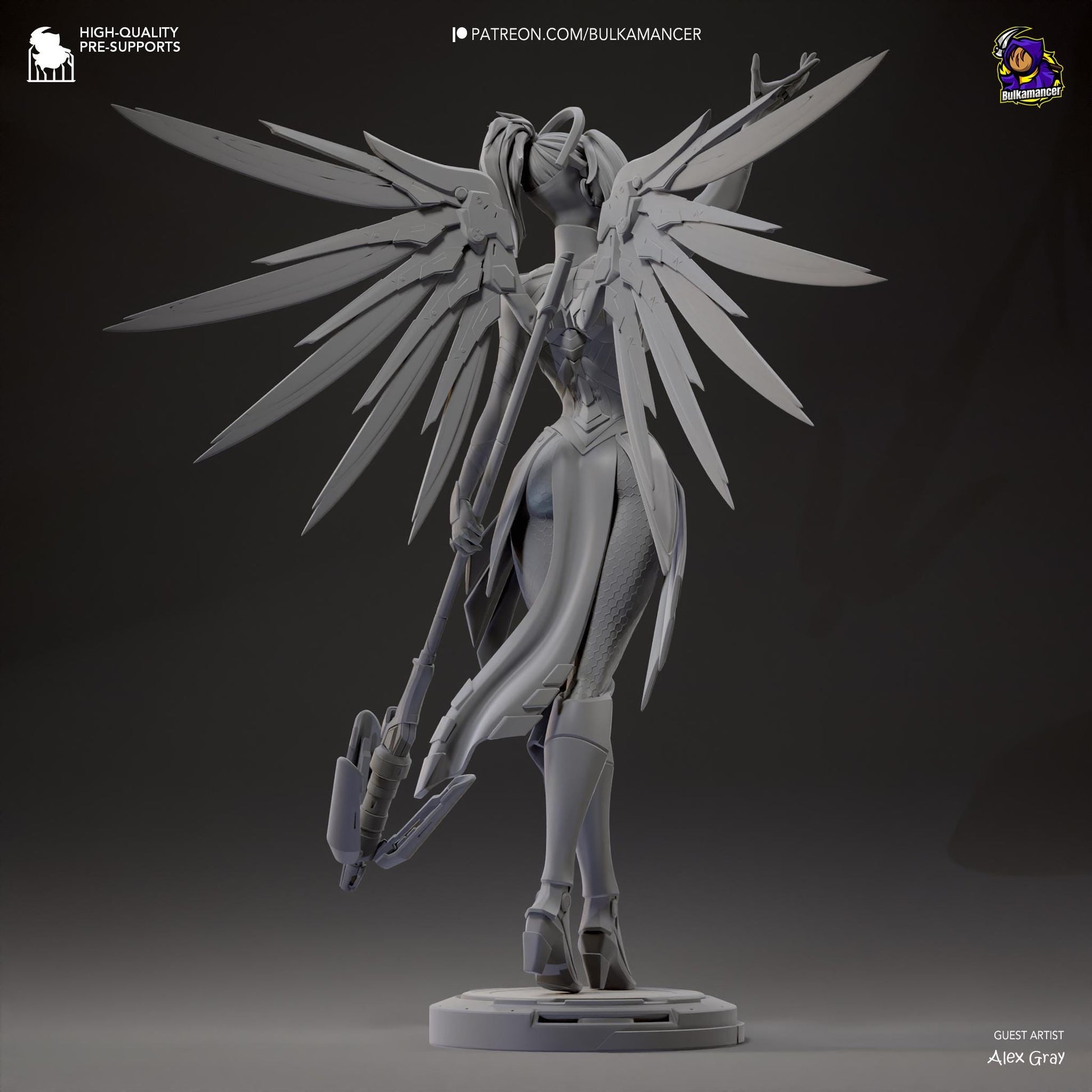 a statue of a woman with large wings